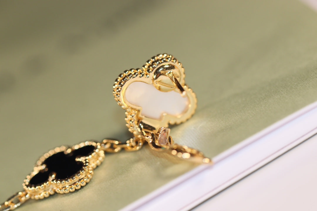 EARRINGS GOLD ONYX MOP 3 MOTIF mysite