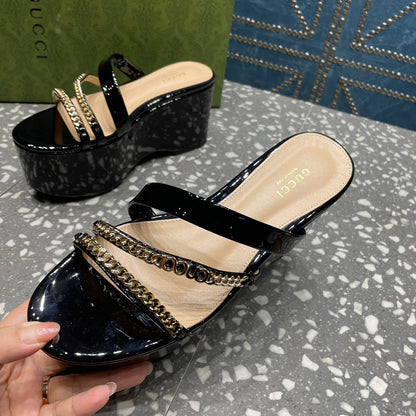 HIGH WEDGE PLATFORM IN BLACK CALFSKIN WITH GOLD HARDWARE mysite