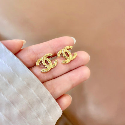 CHANEL 26S CHANEL CC LOGO WOVEN METAL STUD EARRINGS IN GOLD METAL 633305 mysite