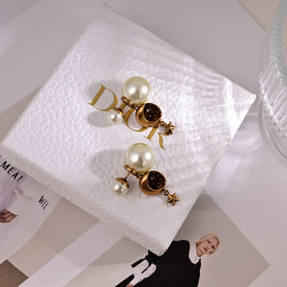 CD 26S CELESTIAL STAR PEARL DROP LOGO EARRINGS IN GOLD TONE METAL 629950 mysite